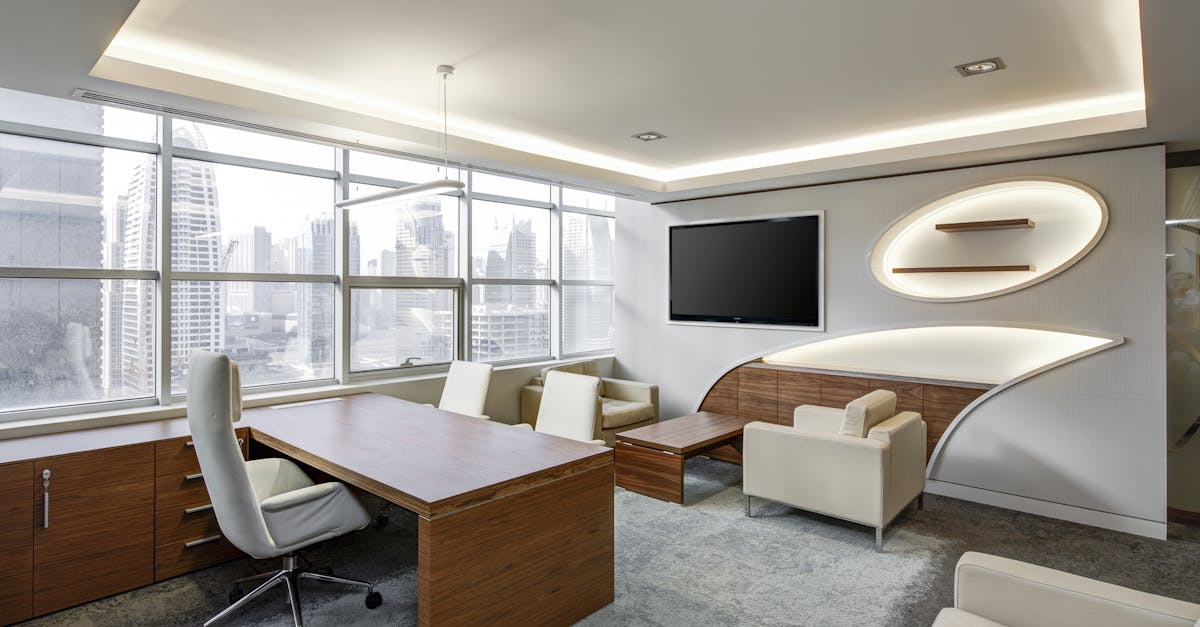 Sleek office space featuring contemporary furniture and city skyline views, ideal for professionals.